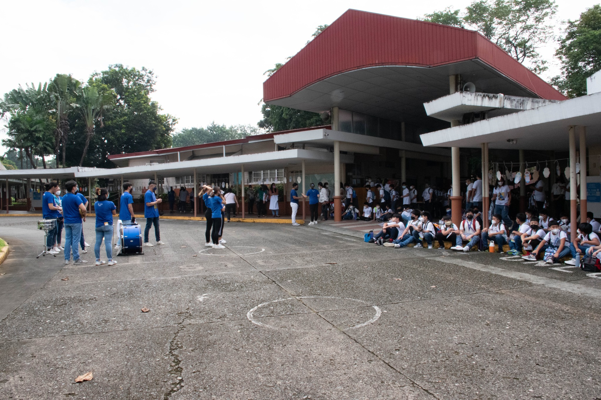 Members of the Loyola Schools Blue Babble Band and Battalion perform for the boys