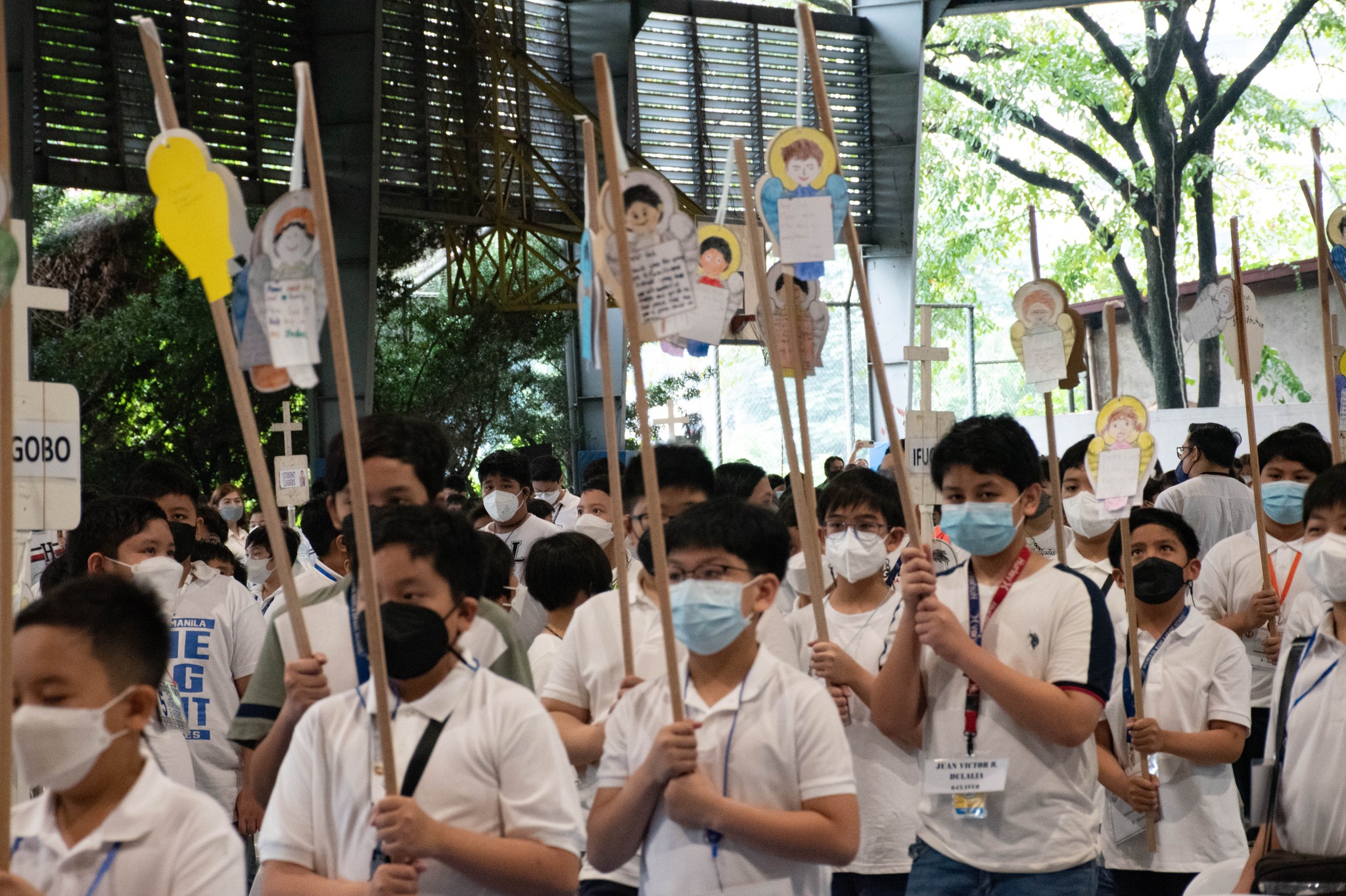 The grade 5 boys created angel artworks which were used during the processional. 