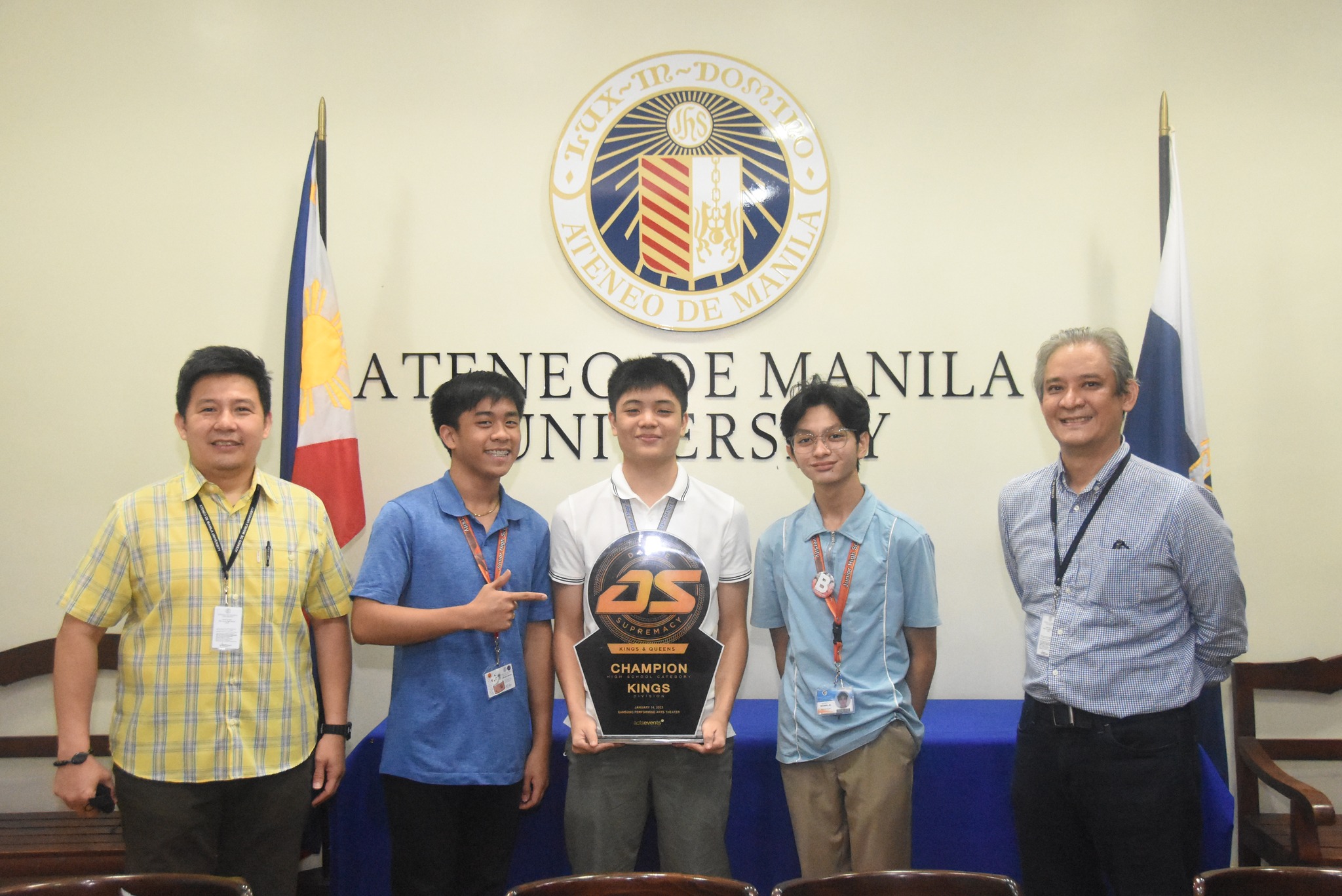 From left: APFor (and IndAK founder) Ron Capinding, Stephen Materum, Roque Bonifacio, Audie Secerio, and AJHS Principal Jonny Salvador (+) celebrate IndAK's 2023 Dance Supremacy triumph. 
