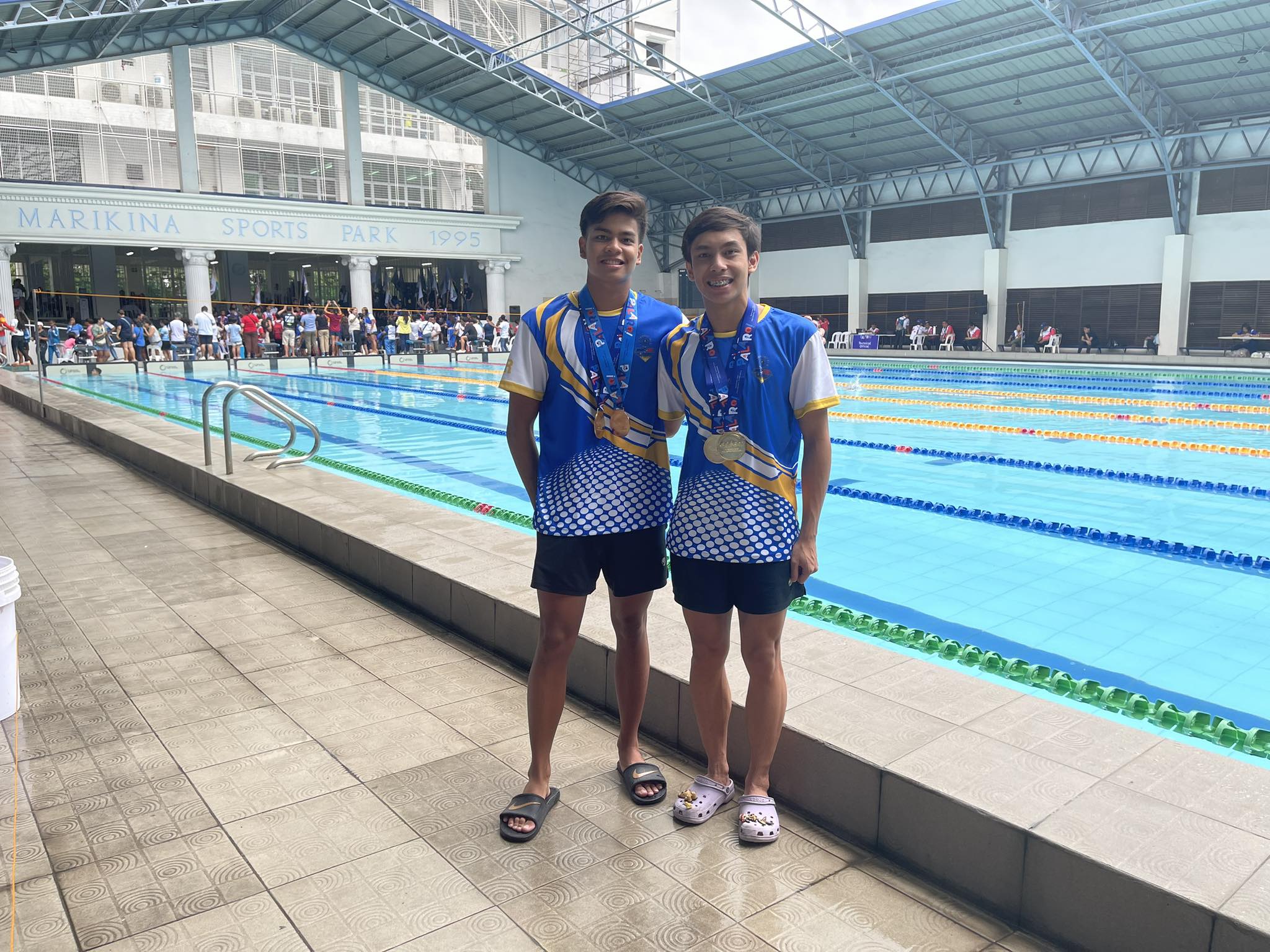 Ateneo SHS swimmers Renzo Tirol and Ivo Enot helped Team NCR set two relay records in Palarong Pambansa 2023.  