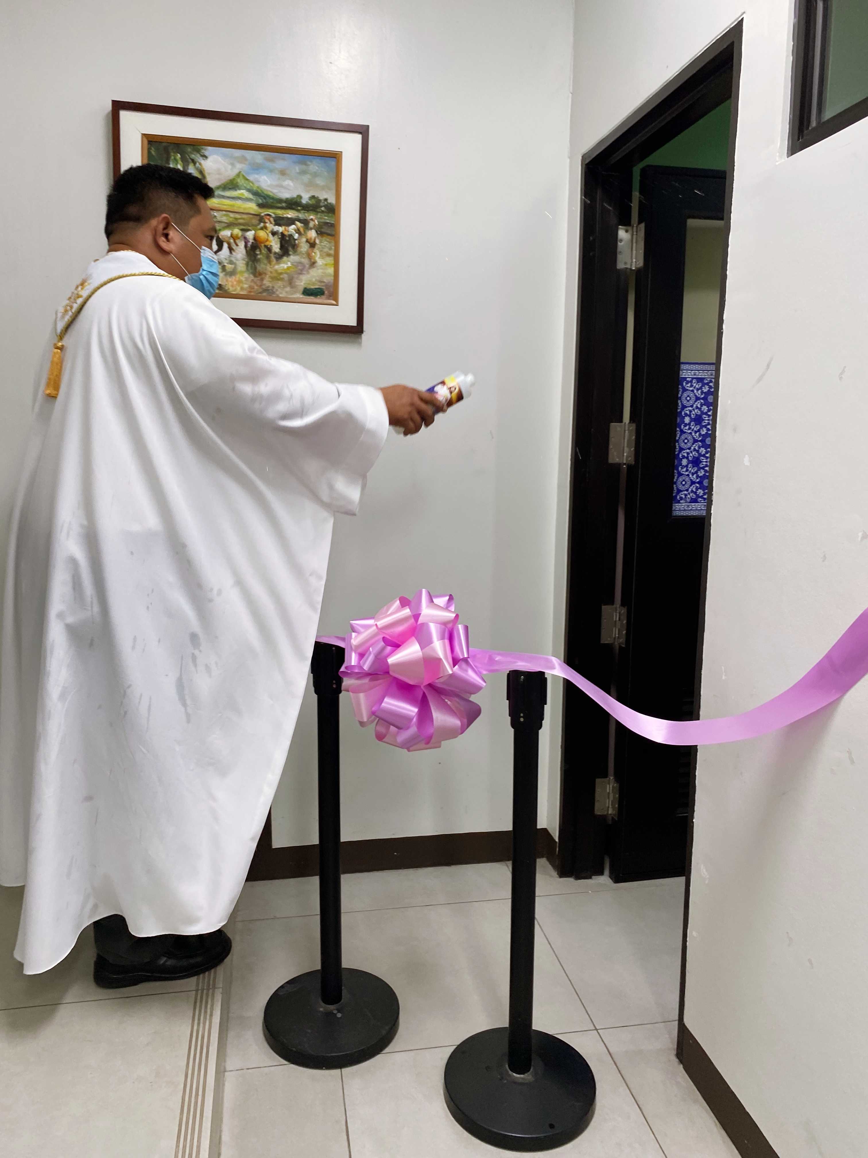 Fr. Bong Dahunan SJ blesses the Lactation Room