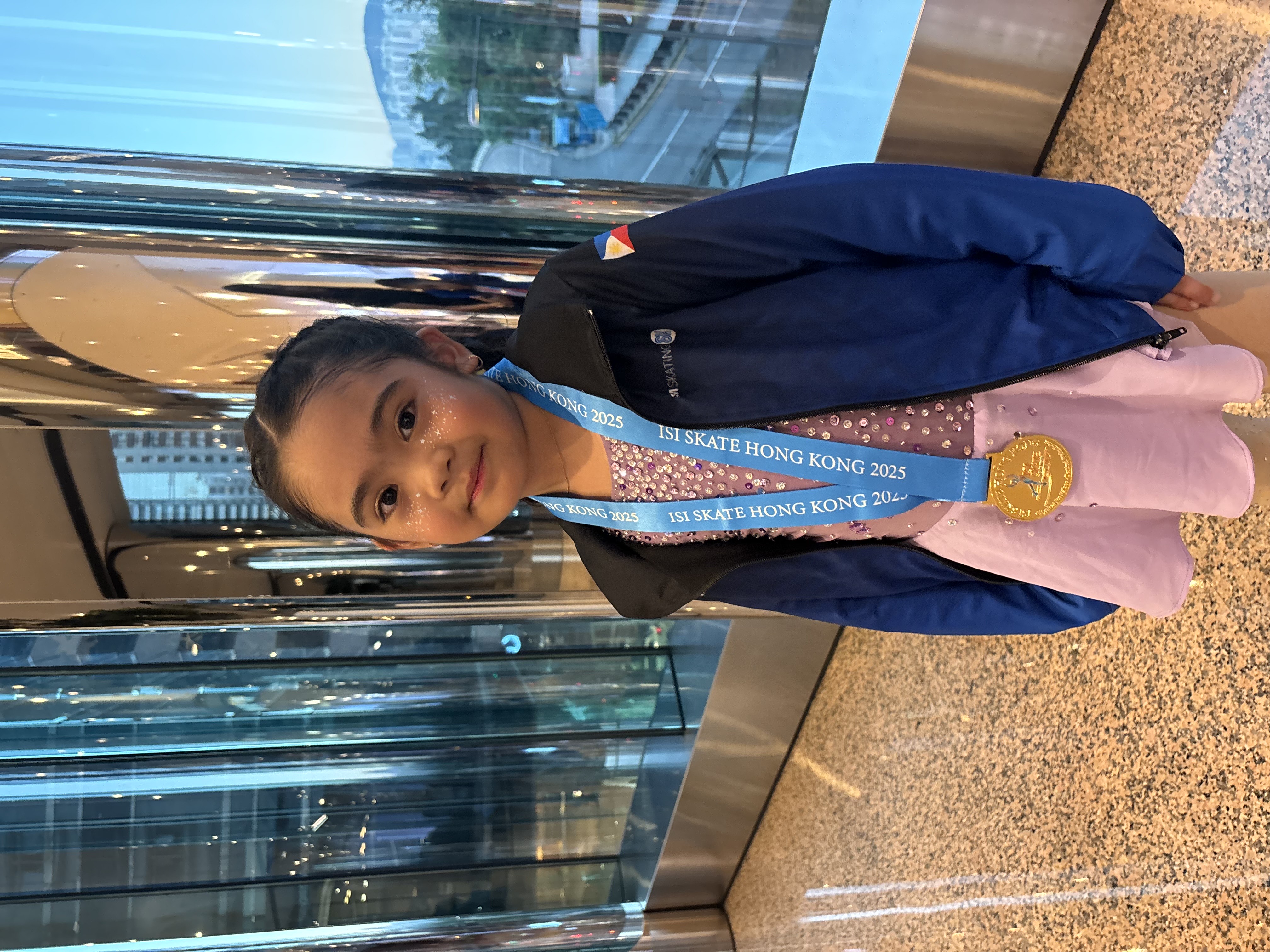 Alex Monje with her gold medal 