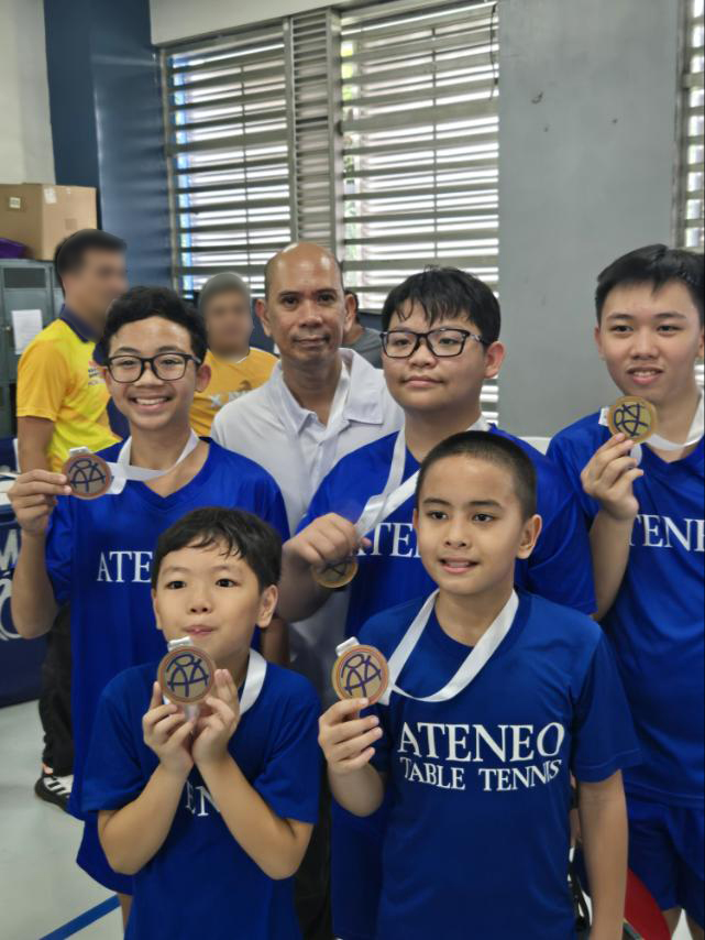 (clockwise from left) Micael Pacia, Coach Leo Raymundo, Chase Daya, Altair Capistrano, Titus Pachica, Rafa Tongson
