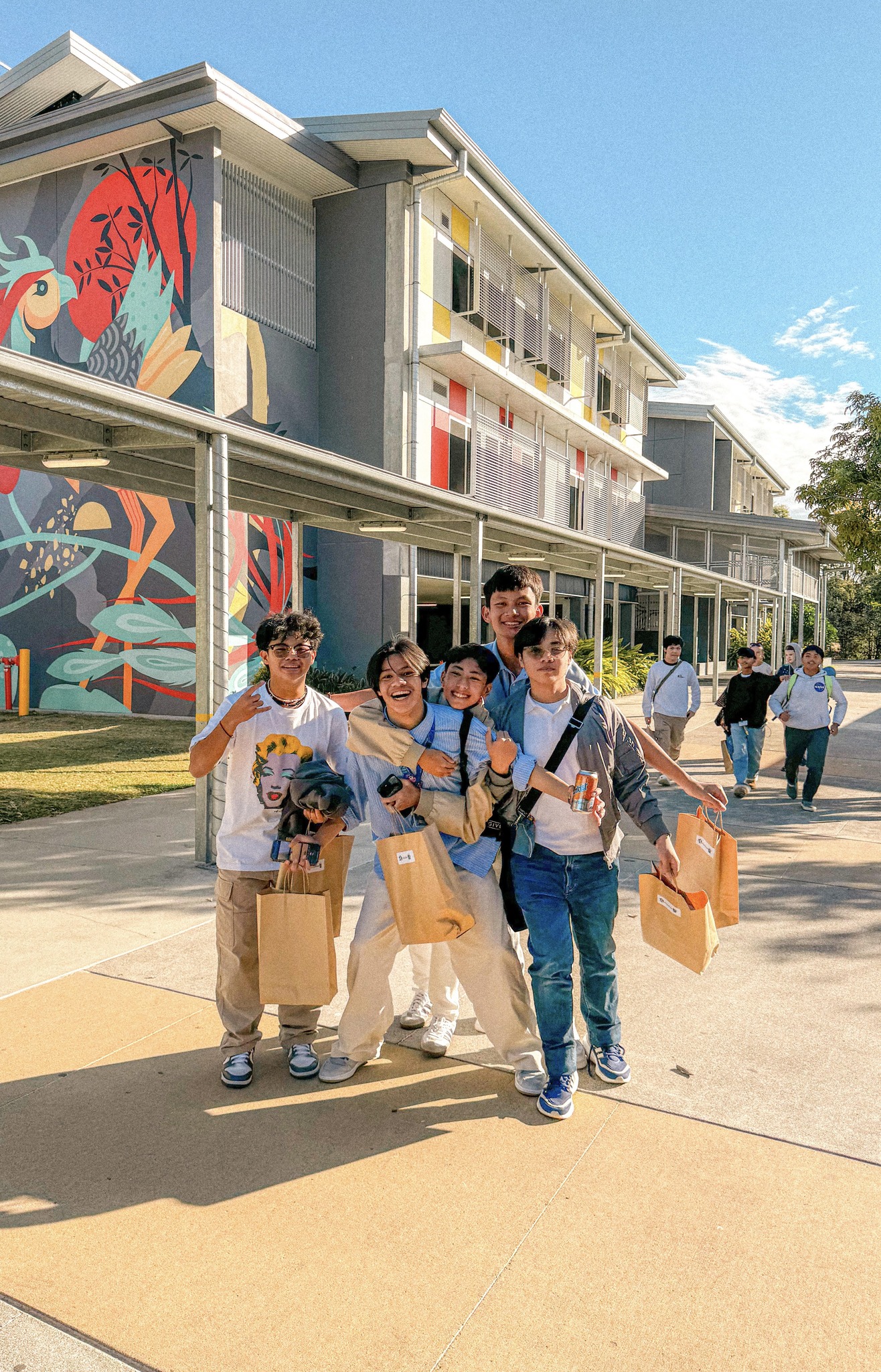 Skye Pecjo and groupmates leaving Burpengary High School, marking the bittersweet end of their stay in the school