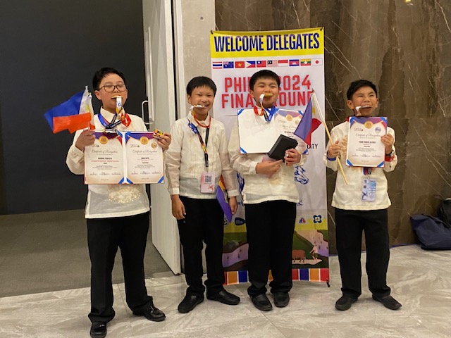 Batchmates (from left) Shun Sato, Russ De Belen, Rav Vergara and Ethan Alferez after the onsite awarding for grade 5 medalists 