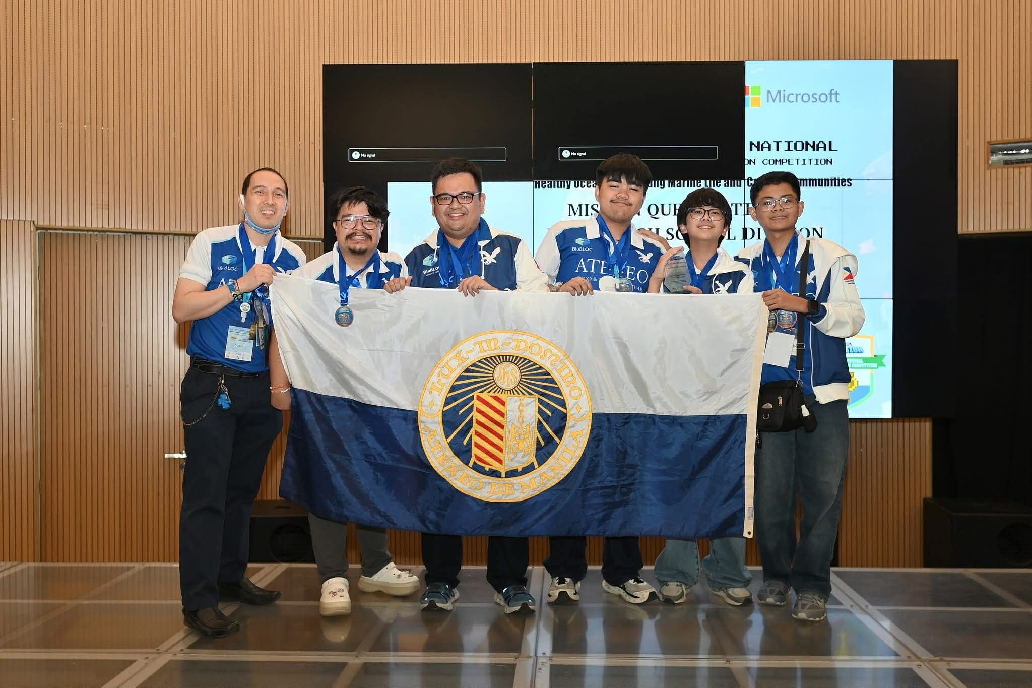 BluBLOC Coaches pose with JHS Mission Quest 3rd Placers Aidan Cabaya, Migo Manalac, Marcus Crisostomo 
