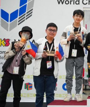 (L-R) Toby Litiatco, Sean Villanueva, and Leo Borromeo made history for the Philippines on August 14 when they placed 2nd in the Nations Cup event of the Rubik’s World Championships.