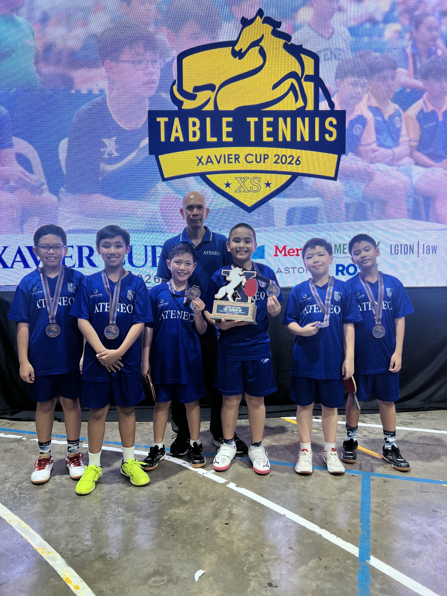 From left: Marius Allas, Philo Go, Karl Guanio, Coach Leo Raymundo, Titus Pachica, Rafa Tongson, and Caian Sanidad.