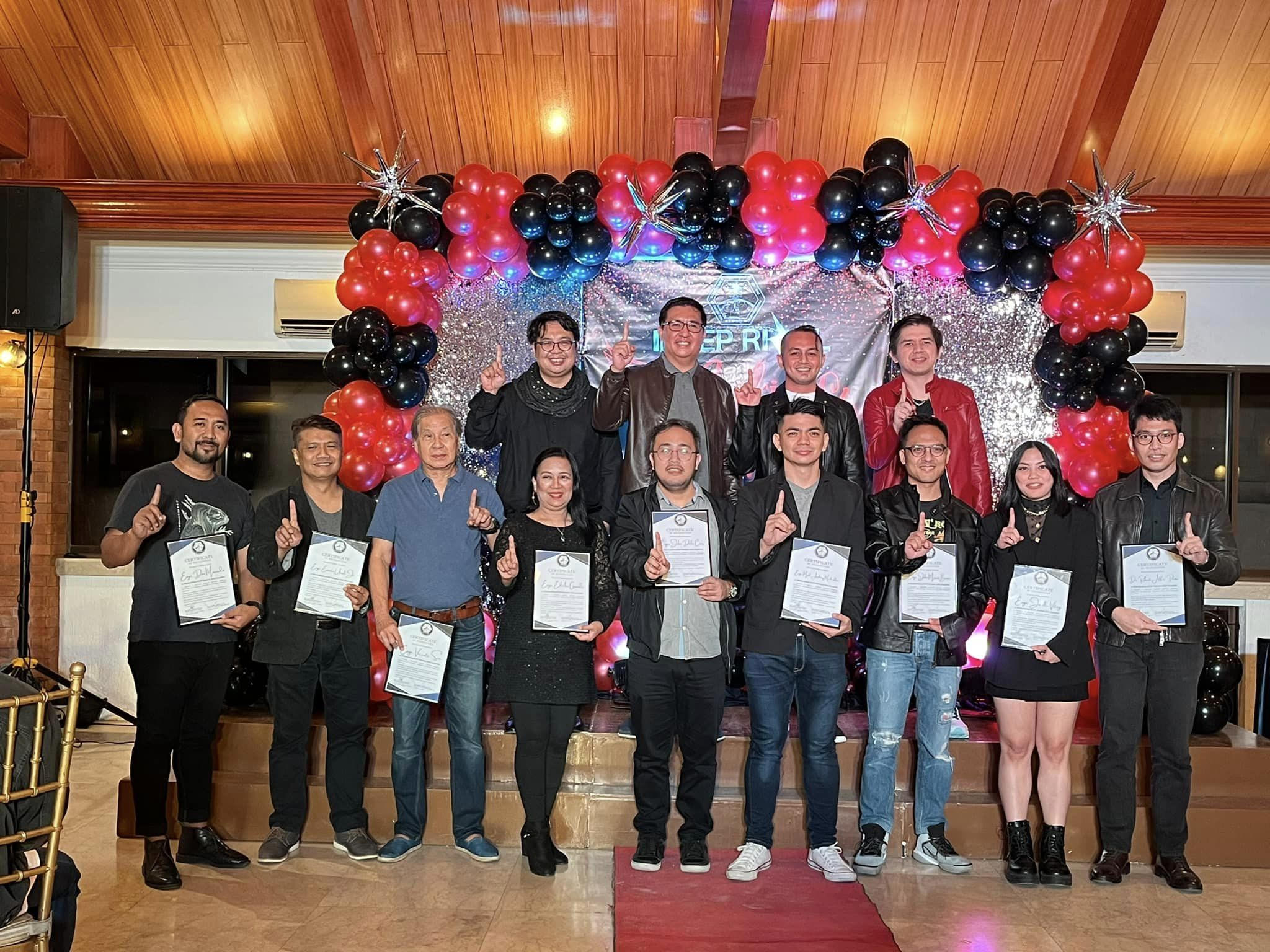 Dr. Peña (rightmost, front), together with the awardees and officers of IECEP.  