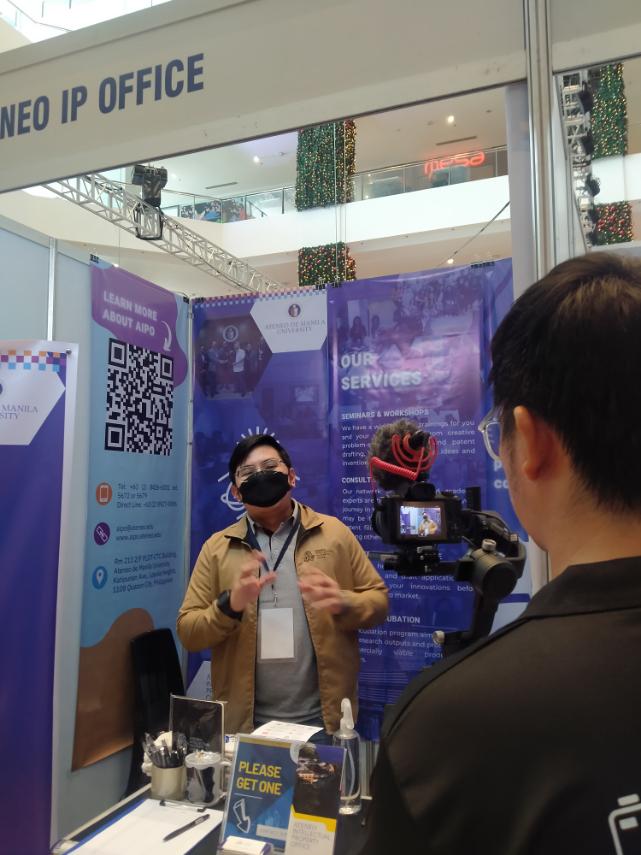 AIPO Booth with Mr Bryan Erfe