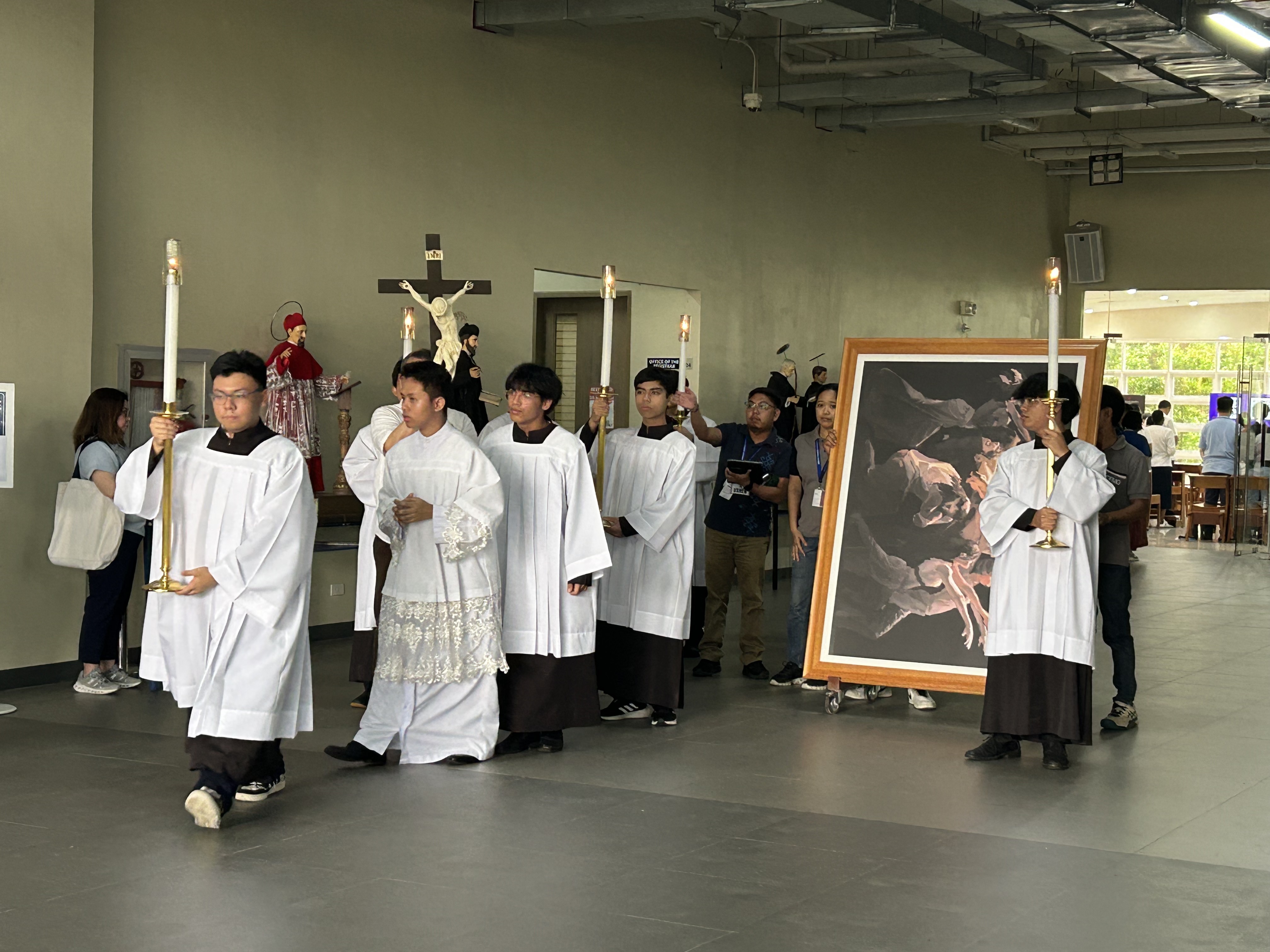 Josh Ong Ante's painting joins the Way of the Cross procession