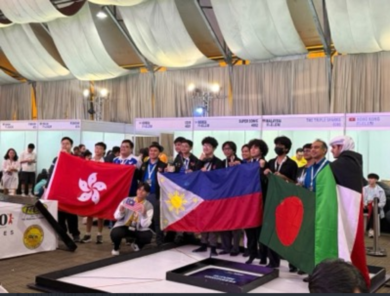 The WRO Future Engineers teams from Malaysia, Kuwait, the Philippines, Hong Kong, and Bangladesh pose for group photos on the playing mat after the competition.