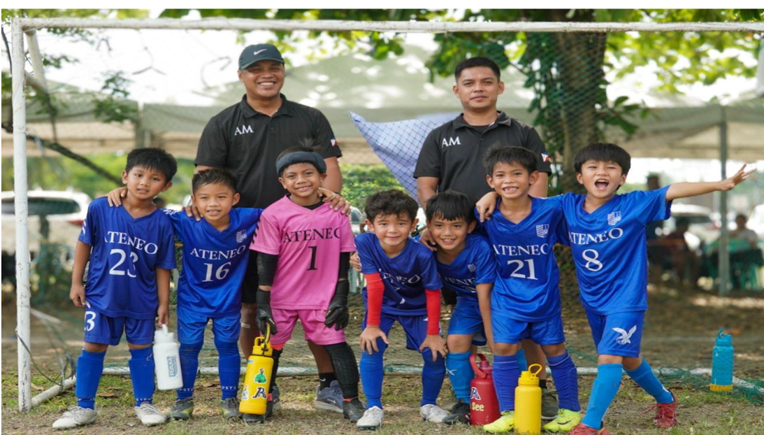 On Day 1, the Blue Eagles played up in the U8 Division and finished 4th out of the 12 teams. Front row from left: Ram Victoriano, Blaze Gonzales, Nathan Garcia, Sage Kim, Jaeden See, Gavin Windsor, Bastian Verzosa;back row from left: Coach Aldous Mirafuentes and Coach Aldous Mirafuentes III  