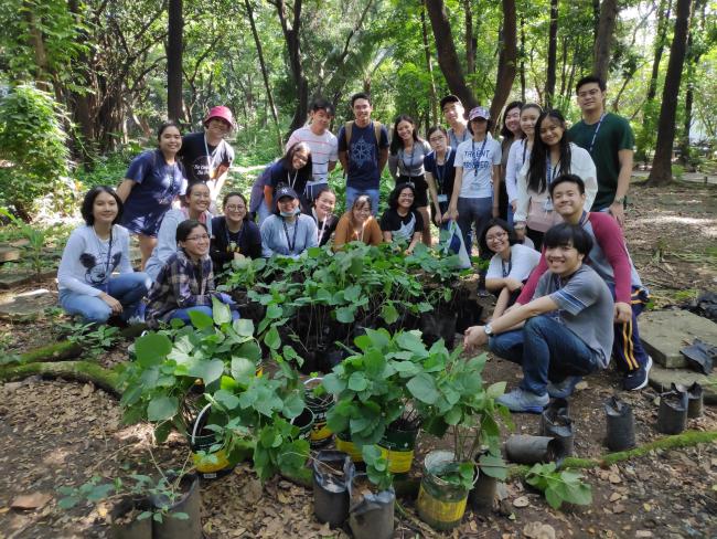 The students with their repotted Baguilumbang seedlings