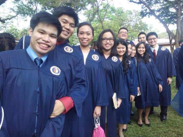 Domingo (second from left) with Atenean classmates at the 2015 Commencement Exercises.