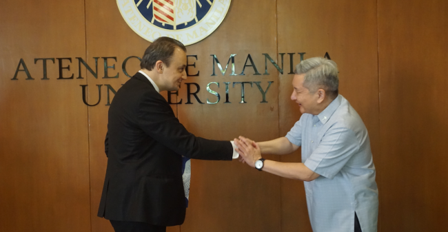 Ambassador Akyol shaking hands with Fr Bobby Yap SJ