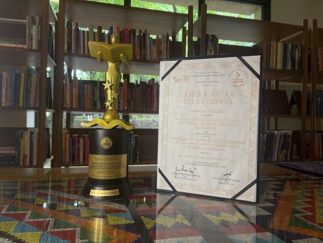 The trophy and certificate from the National Book Awards