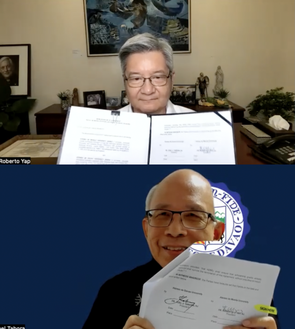 Fr Roberto Yap SJ and Fr Joel Tabora Yap sign the MOA to create the Madaris Teachers Scholarship Program