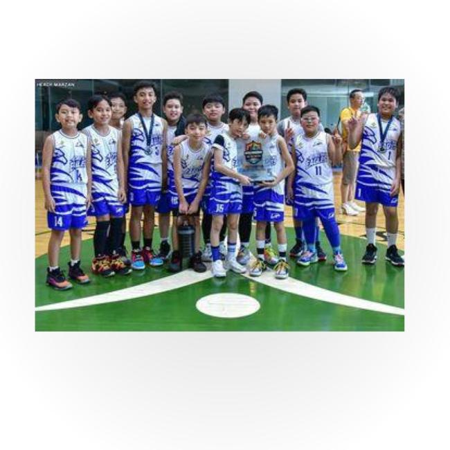 The 13 AGS boys of the "Blazing Eagles" team 
