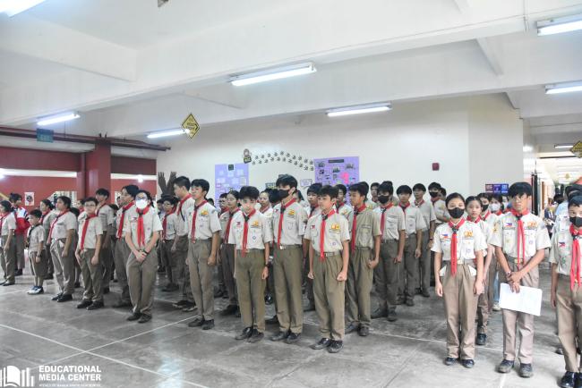 The Scouts are snappily assembled and ready for the recognition rites  