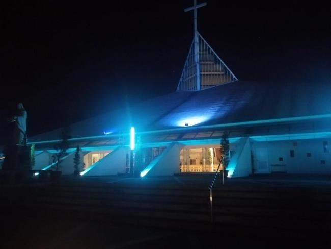 Church of the Gesu lit up in blue