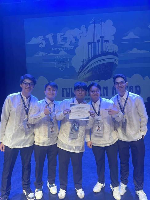 (L-R) Louver Pastrana, Jay Mendoza, Mig Ferrer, EJ Porta and Ethan Velardo onstage at the STEAM convention following their big win   