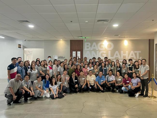 Our Teacher Coordinators, principals, and friends from DepEd and the San Mateo LGU pose in front of the GBSEALD mural “Bago ang lahat, edukasyon”