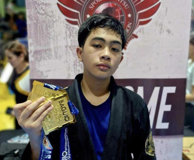 Alonzo Fernandez with his two golds in the Baguio International Open Jiu Jitsu Championship 2024 