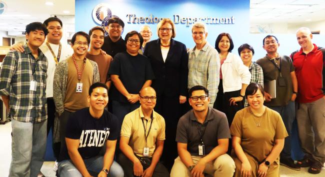 Hinzes with the Department of Theology faculty