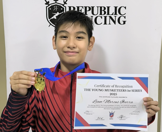 Liam Ibarra poses with his gold medal from the Young Musketeers tournament