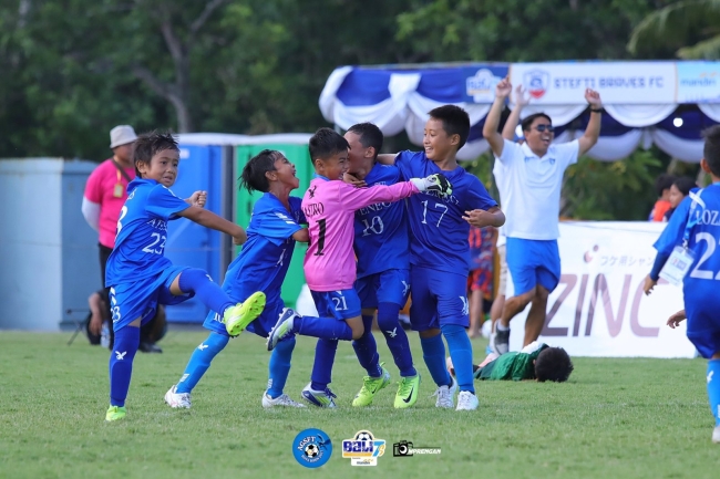The Ateneans rejoice after winning the Bali 7s international youth football tournament