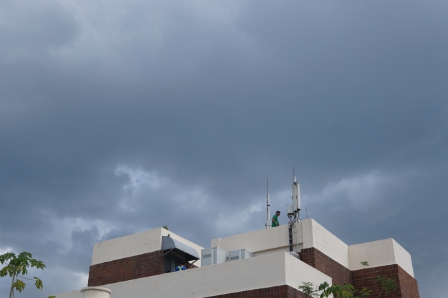 Dark skies over the Ateneo de Manila University campus in Quezon City, Philippines, forebode possible rain. During the “Habagat” or southwest monsoon season from July to September, rains over the western Philippines can be exacerbated by tropical cyclones far to the east of the country that don’t even make landfall. (PHOTO: Aaron R Vicencio / ADMU)
