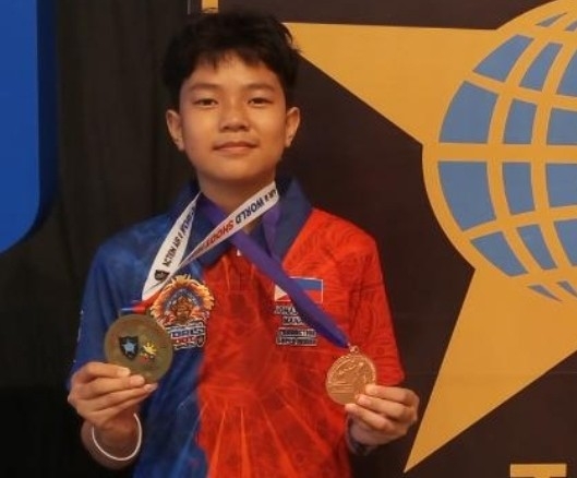 Ka-el Manalo and his 3 medals from the Action Air II World Shoot 2025 