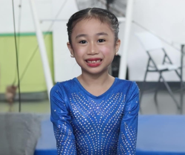 Maxine del Pilar grade 2 gymnast double gold medal winner 