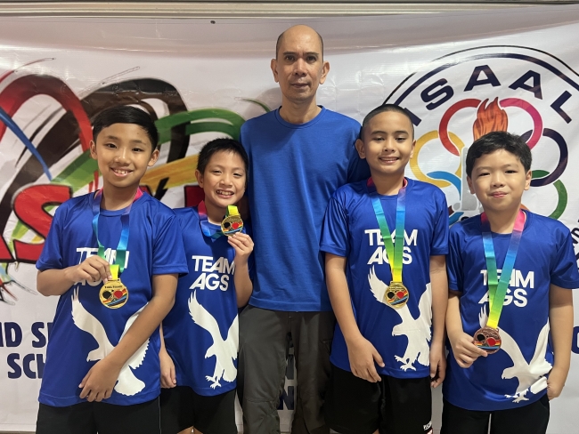 (L-R) Philo Go, Karl Guanio, Coach Leo Raymundo, Titus Pachica, Rafa Tongson