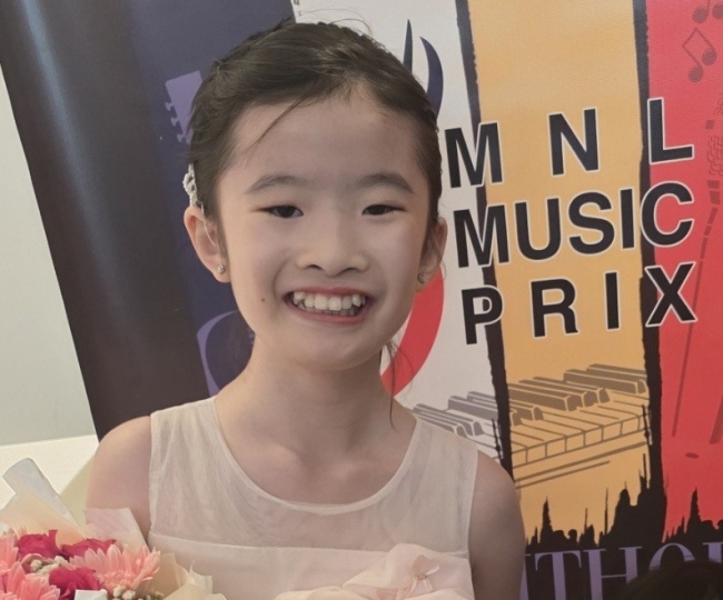 Zia Uy MNL Music Prix winner for Piano B Junior category 