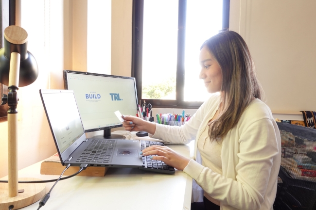 A participant using the TRL Experience Center to demonstrate live National ID E-Verify KYC.