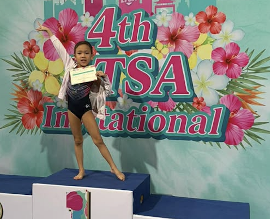 Andi Favis won 4 golds at the LTSA gymnastics invitational  